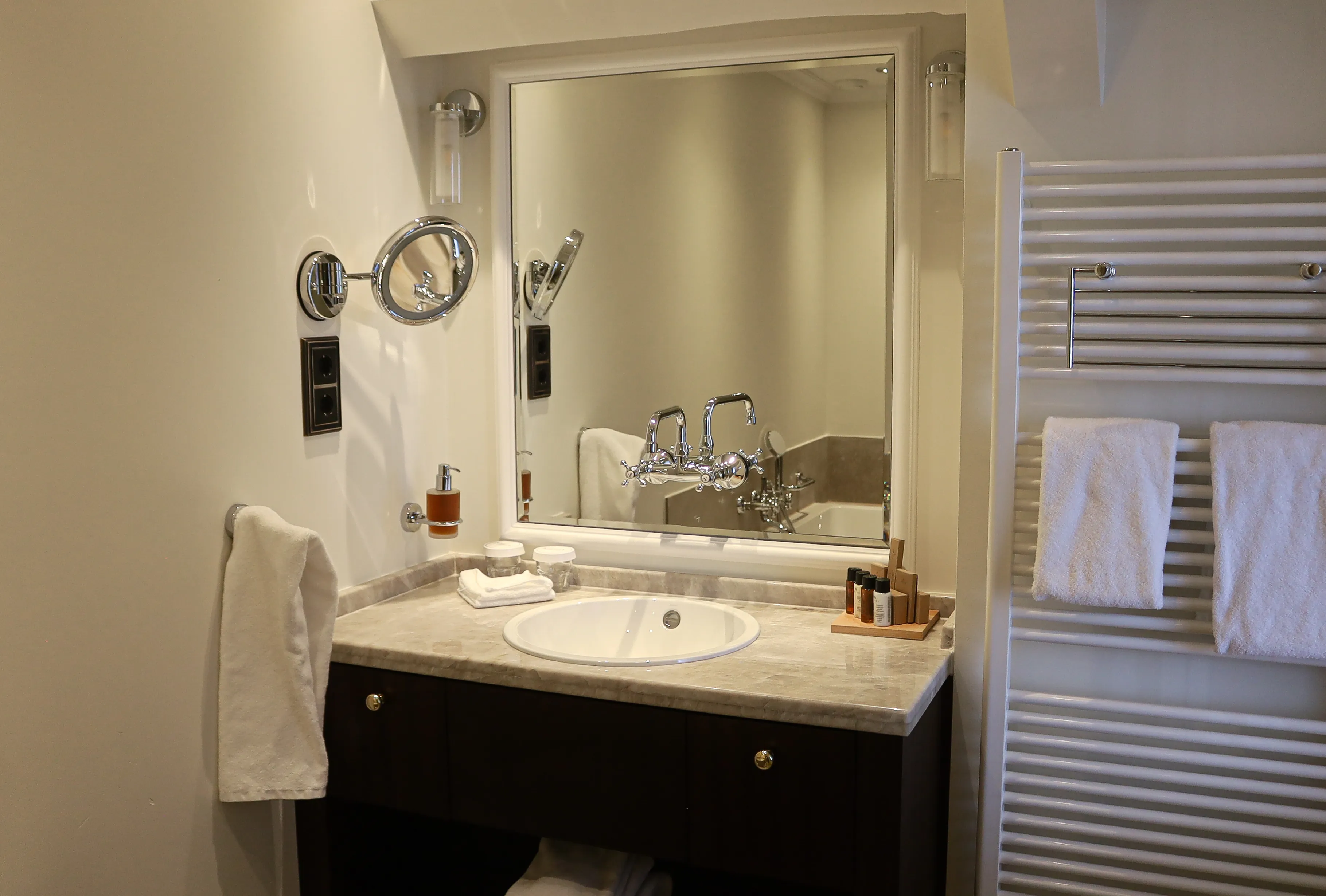 Elegant luxury bathroom with modern fittings at Grand Hotel Karel V